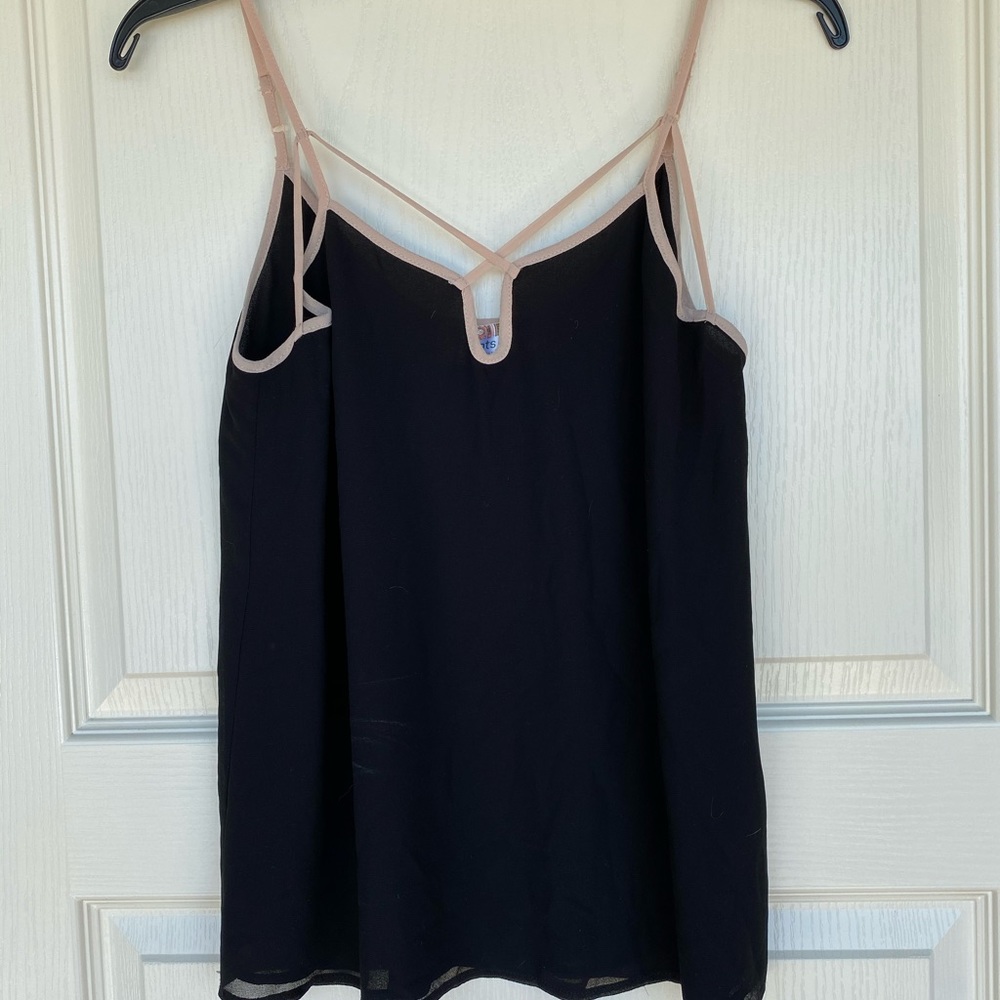 Black top with pink trim work